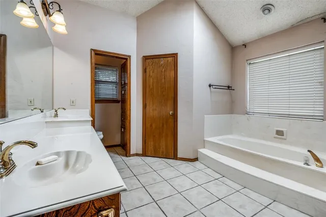 a bathroom with a sink and a bathtub