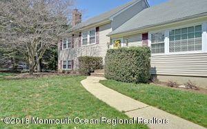 18 Dale Road Middletown, NJ 07748 - Photo 5 of 48 a front view of a house with garden