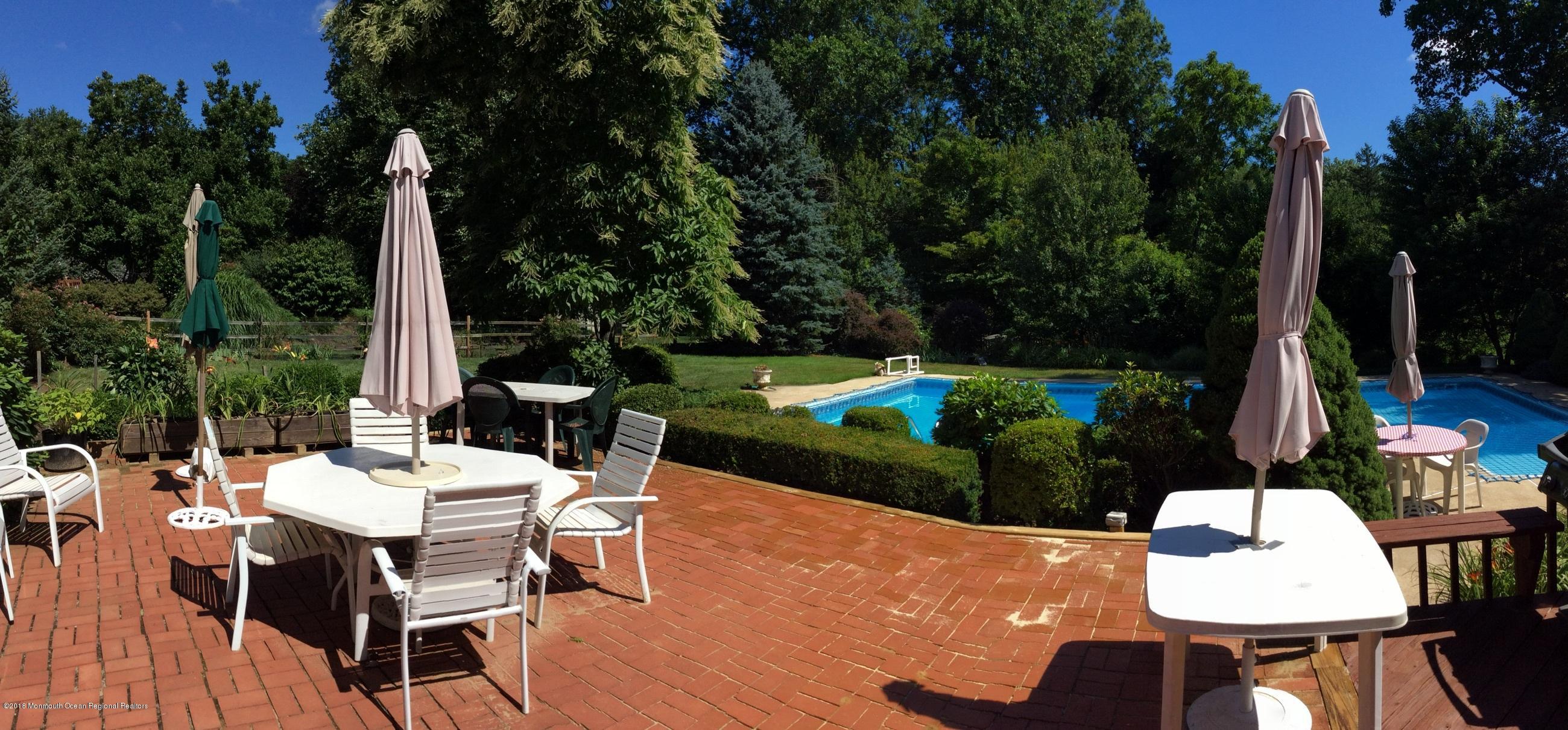 18 Dale Road Middletown, NJ 07748 - Photo 43 of 48 an outdoor space with furniture