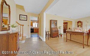 18 Dale Road Middletown, NJ 07748 - Photo 6 of 48 a view of living room filled with furniture and window