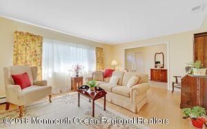 18 Dale Road Middletown, NJ 07748 - Photo 8 of 48 a living room with furniture and a potted plant