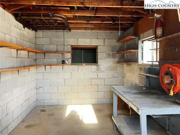 a bathroom with a sink a vanity and window