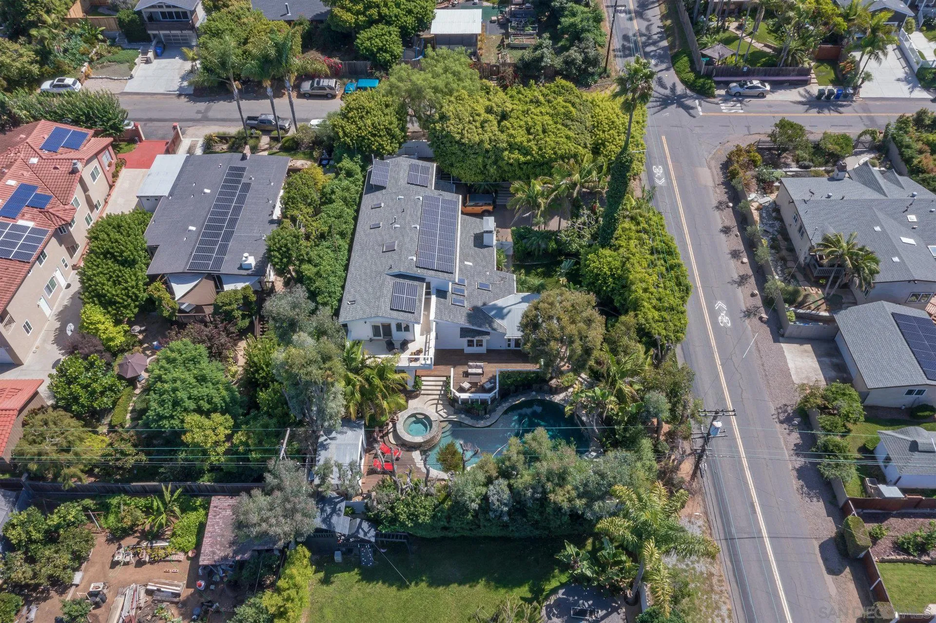 684 Arden Drive Encinitas, CA 92024 - Photo 17 of 59 an aerial view of a house with a yard and lake view