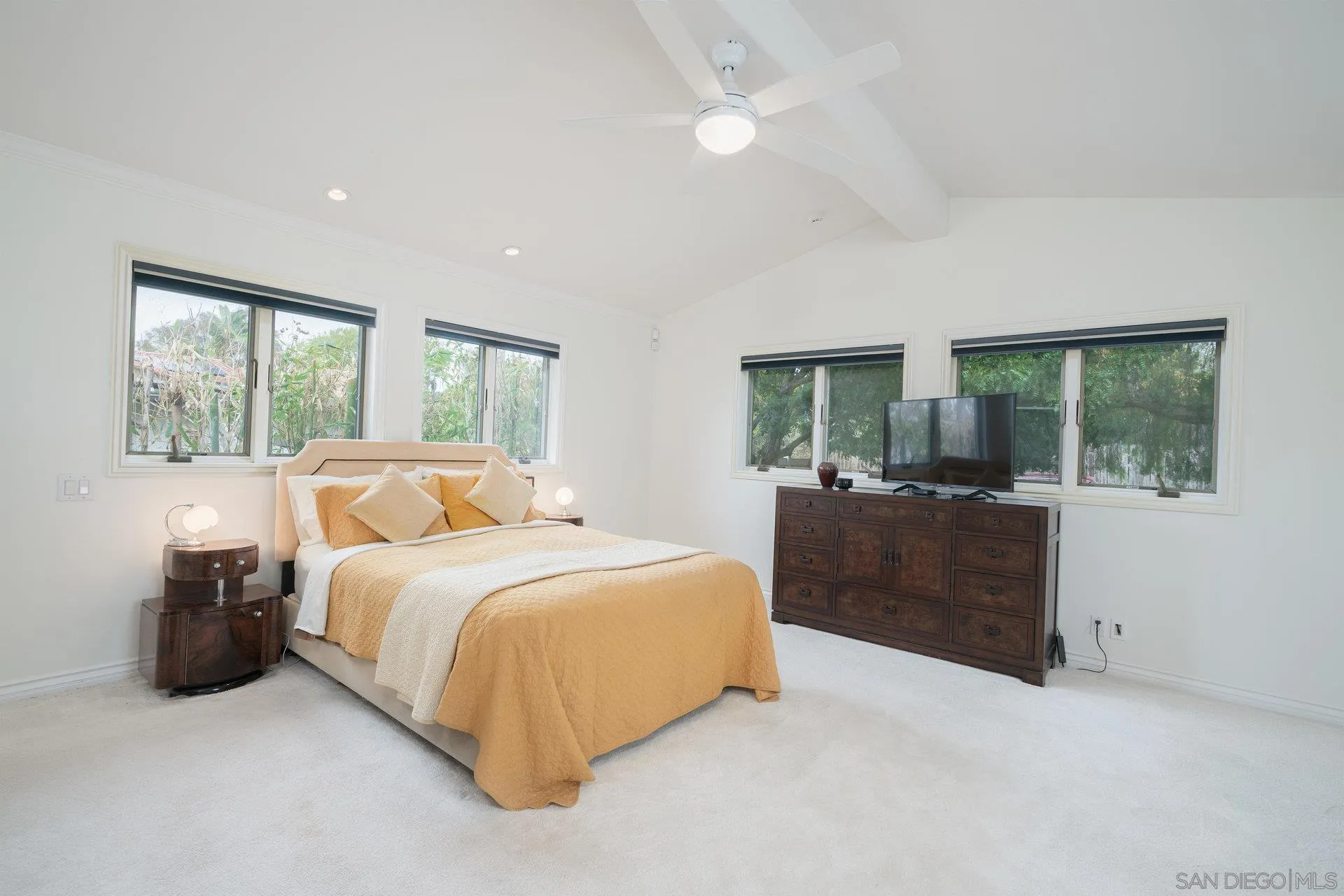 684 Arden Drive Encinitas, CA 92024 - Photo 42 of 59 a bedroom with a large bed and a couch