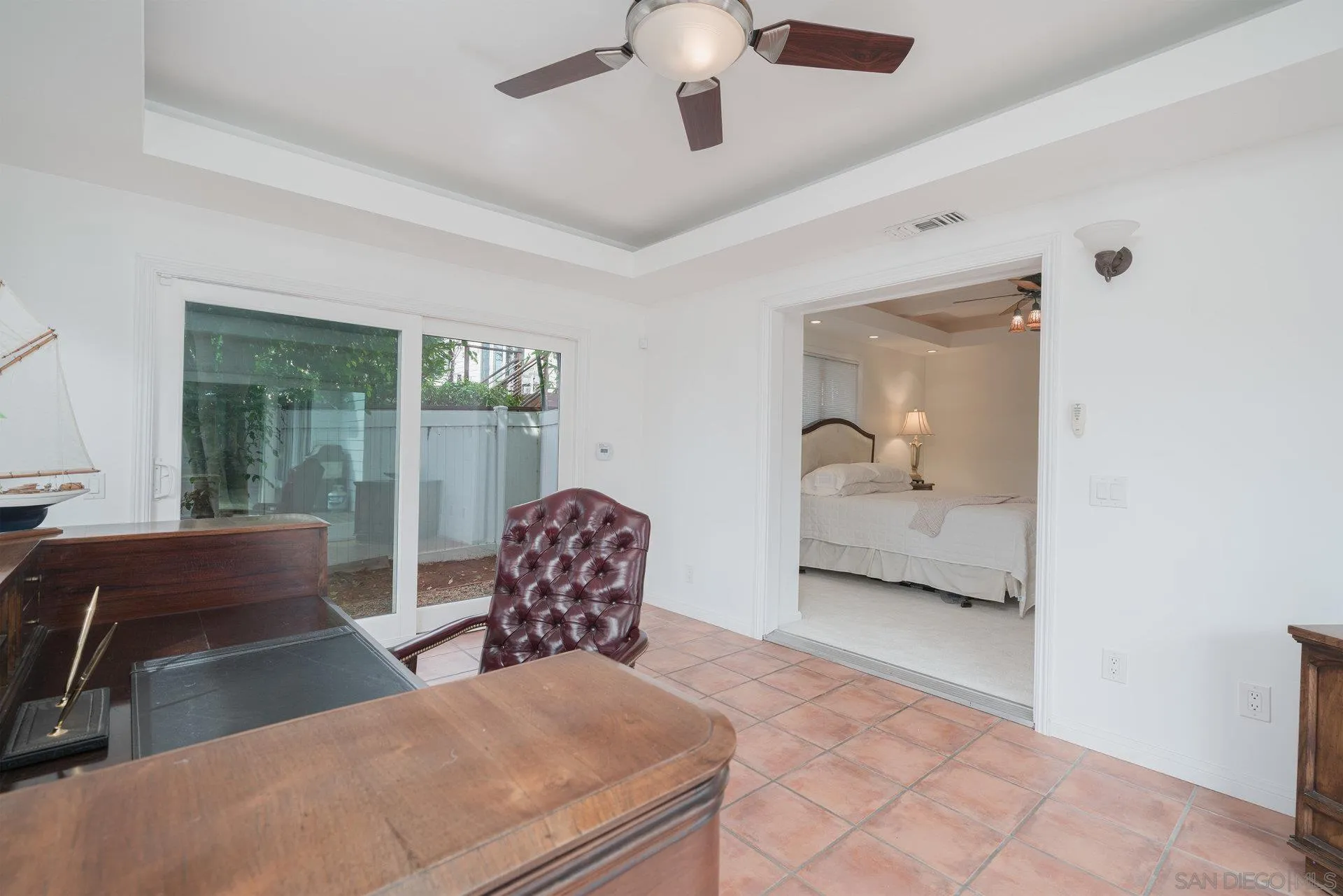 684 Arden Drive Encinitas, CA 92024 - Photo 55 of 59 a bedroom with furniture and a large window