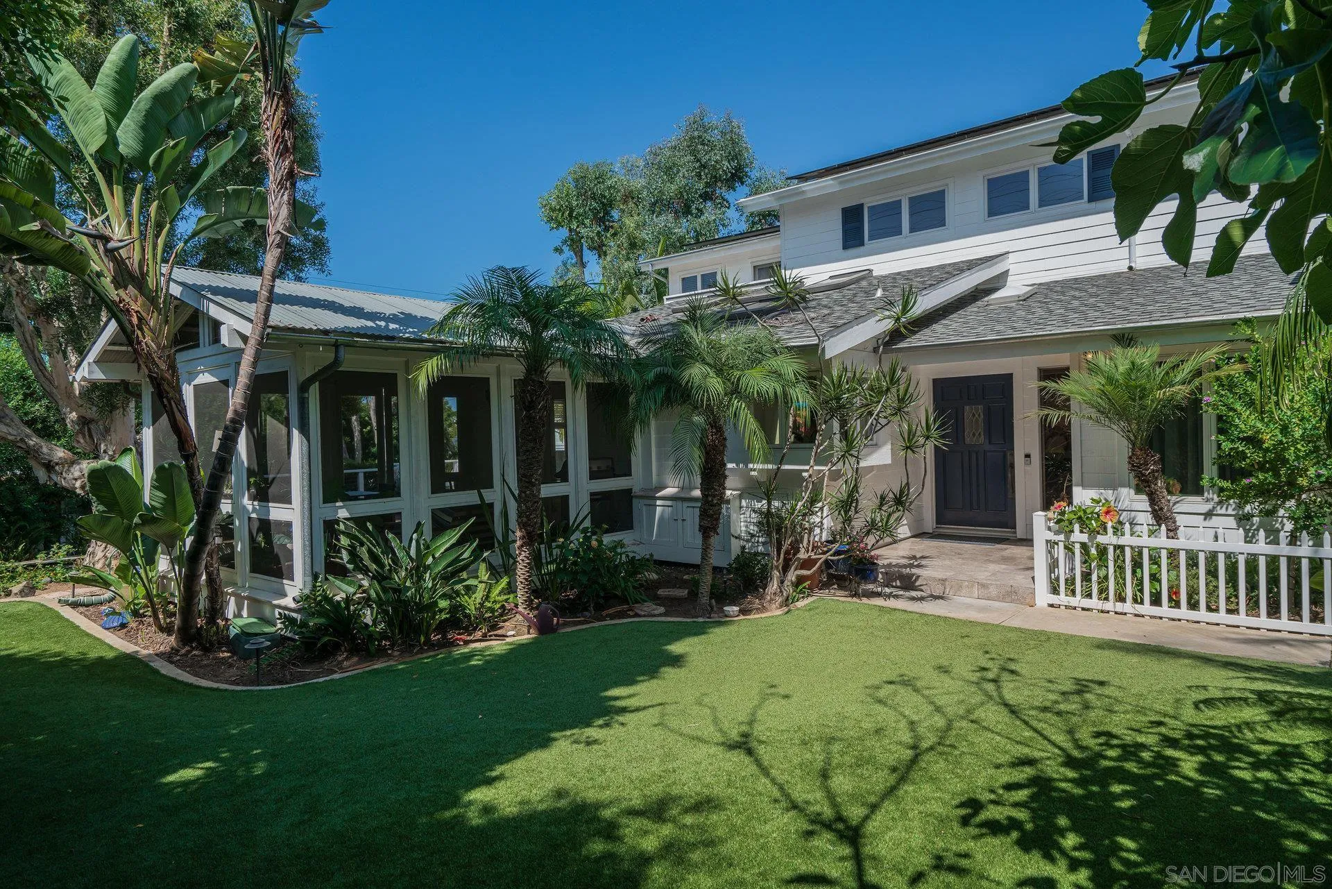 684 Arden Drive Encinitas, CA 92024 - Photo 7 of 59 a view of a house with a yard and plants
