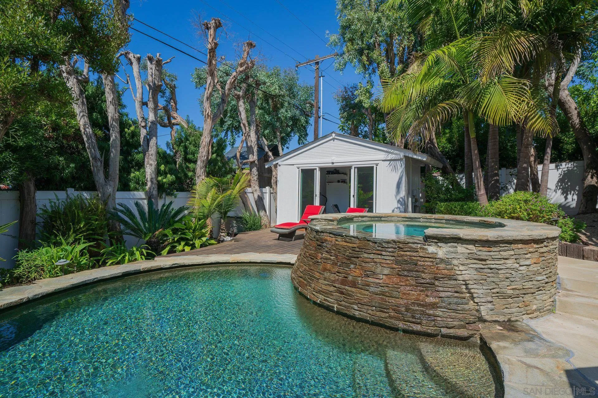684 Arden Drive Encinitas, CA 92024 - Photo 10 of 59 a view of a house with a yard patio and swimming pool