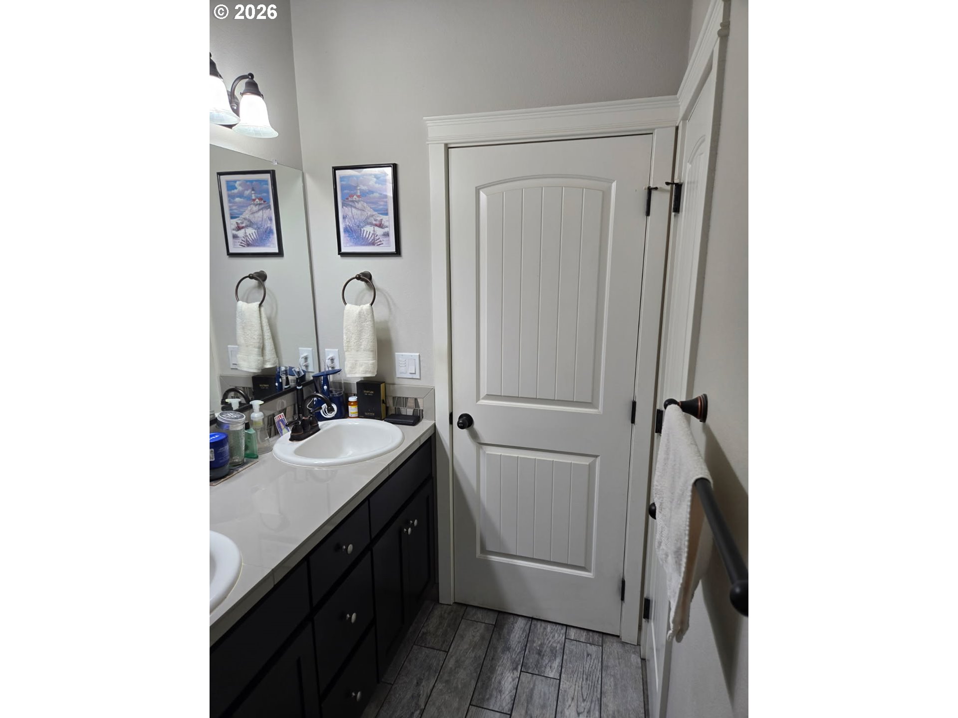 408 Southwest Oak Street Willamina, OR 97396 - Photo 18 of 30 a bathroom with a sink and a mirror
