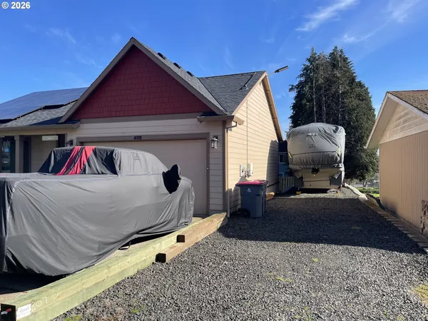 a view of a back yard of the house