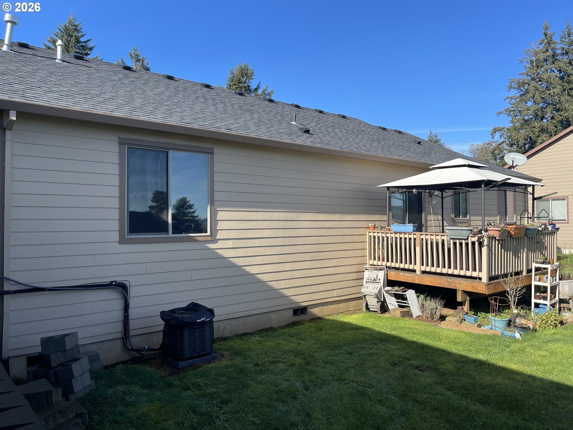 408 Southwest Oak Street Willamina, OR 97396 - Photo 24 of 30 a view of a house with a yard and deck