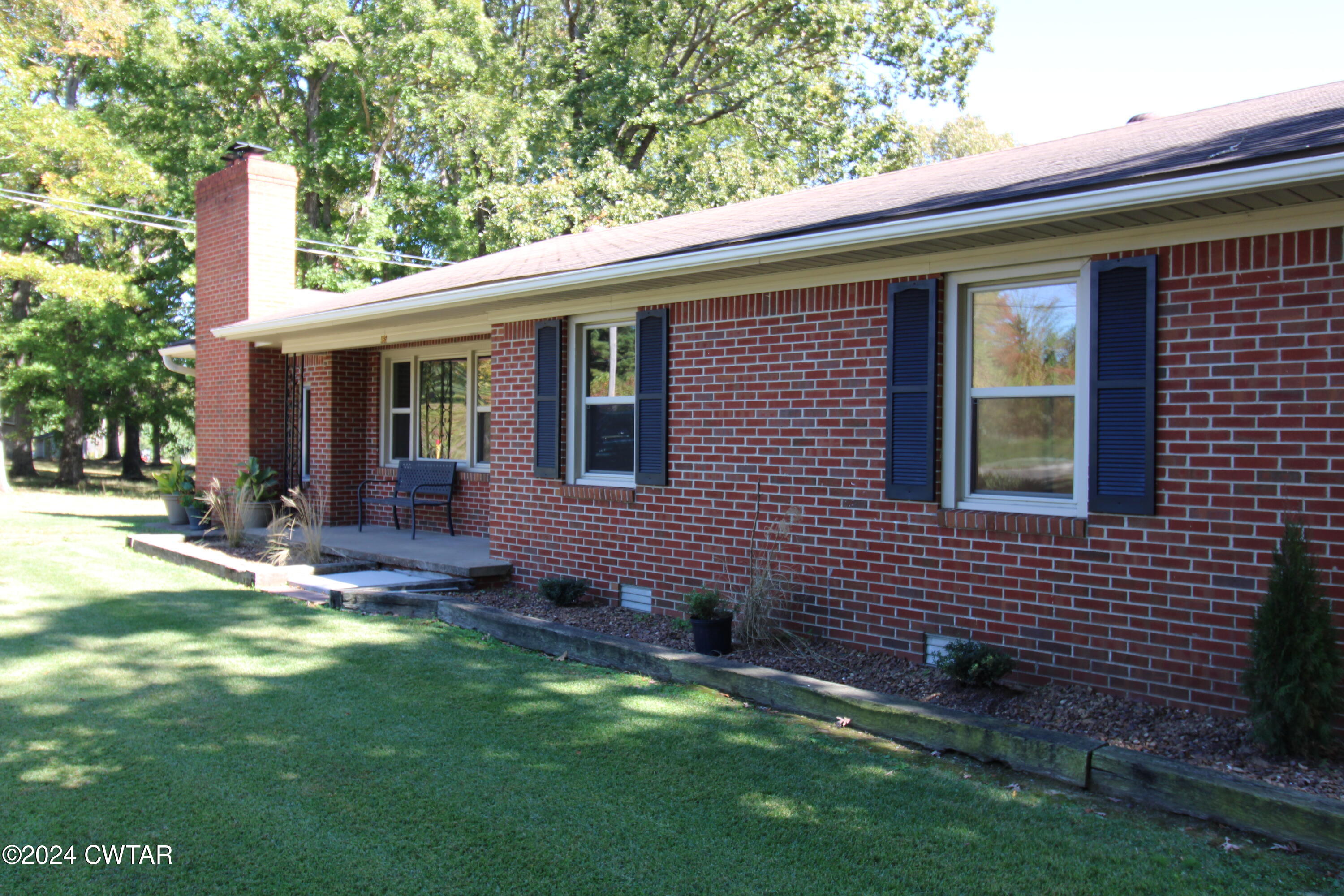 465 Crucifer Road Huron, TN 38345 - Photo 1 of 15 a view of a house with a backyard