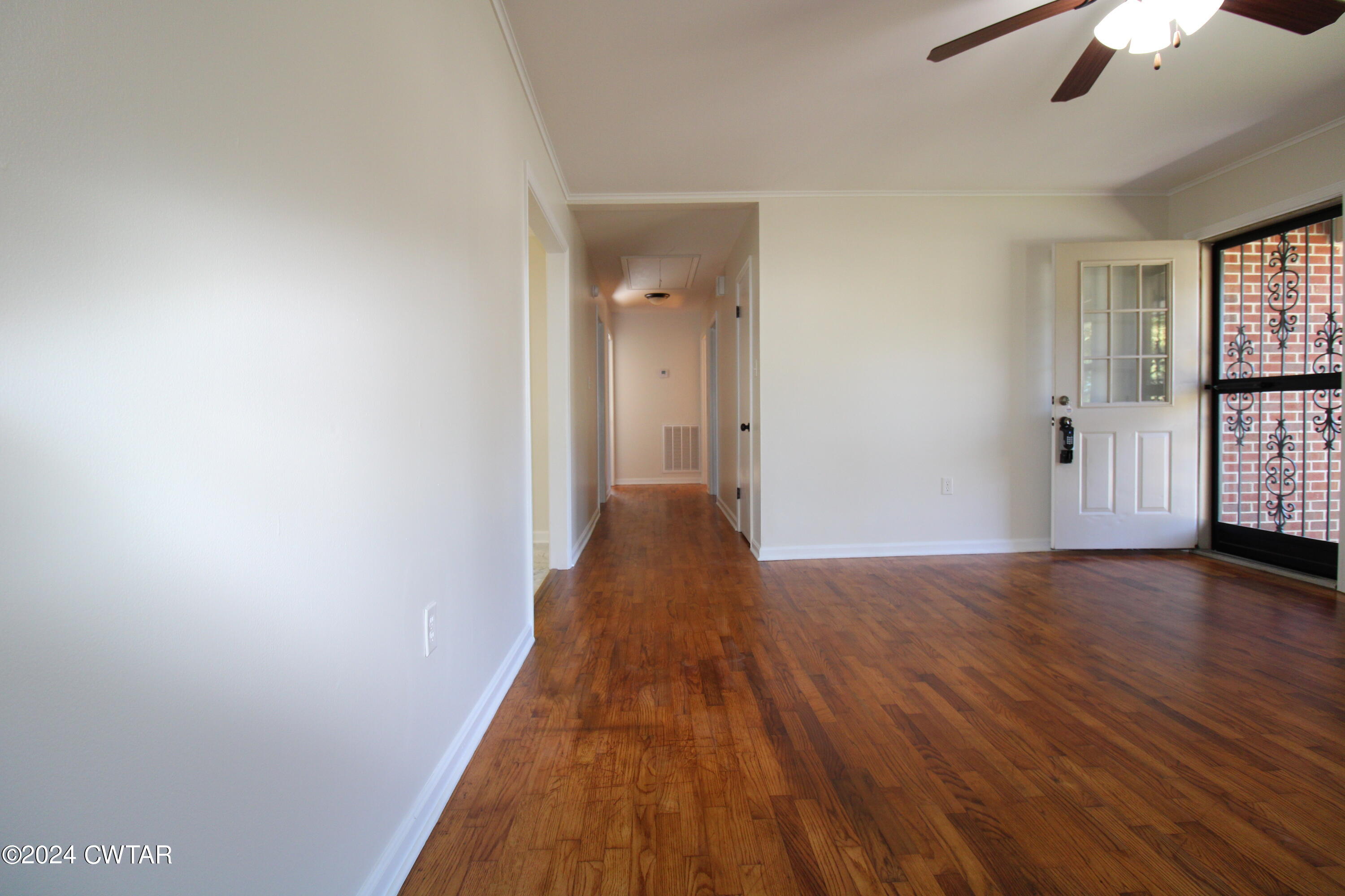 465 Crucifer Road Huron, TN 38345 - Photo 12 of 15 a view of a hallway with wooden floor