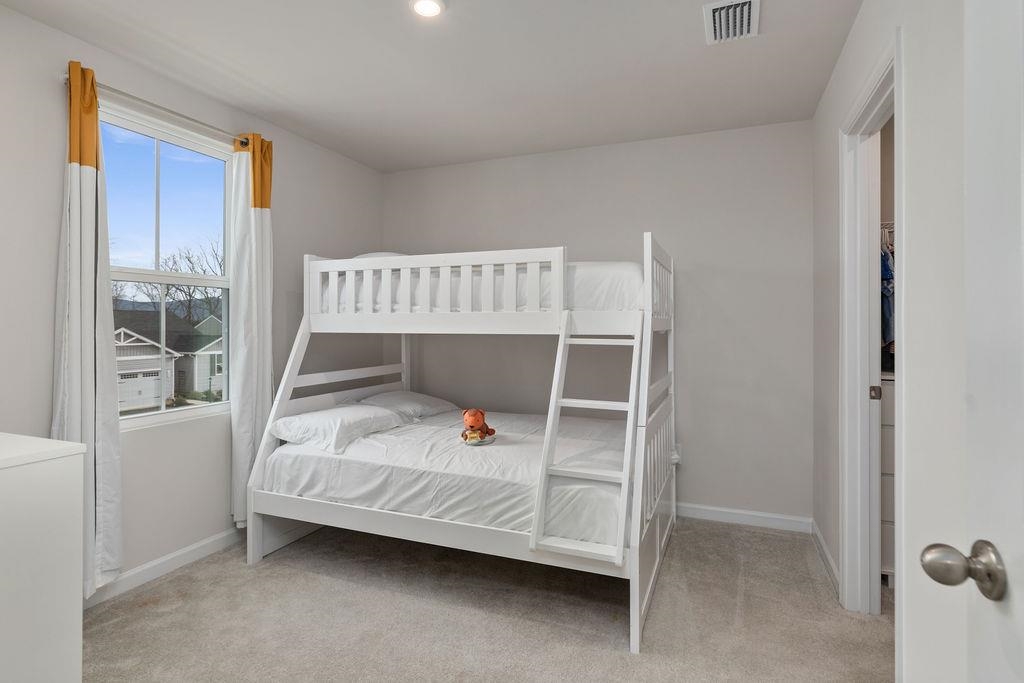 124 Walsh Lane Waynesboro, VA 22980 - Photo 20 of 42 a bedroom with a bed and a window