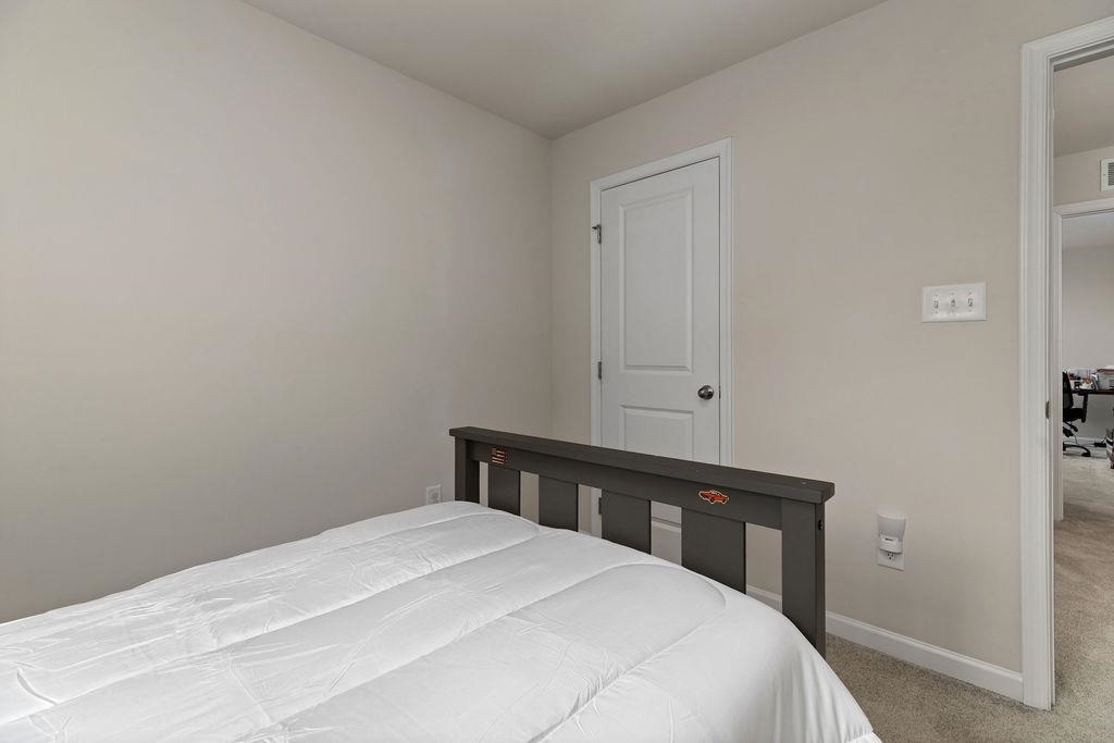 124 Walsh Lane Waynesboro, VA 22980 - Photo 23 of 42 a bedroom with a bed and a window
