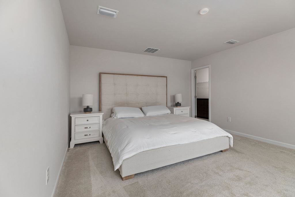 124 Walsh Lane Waynesboro, VA 22980 - Photo 27 of 42 a bed room with a bed and a night stand