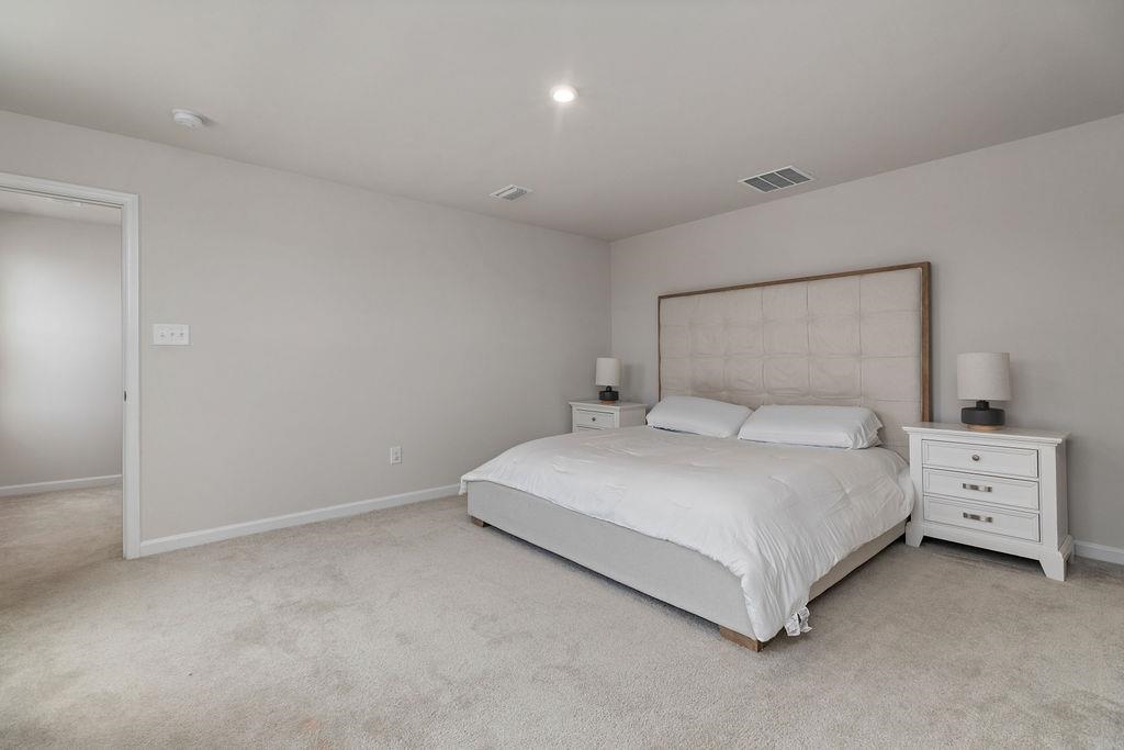 124 Walsh Lane Waynesboro, VA 22980 - Photo 28 of 42 a large white bed in a white room
