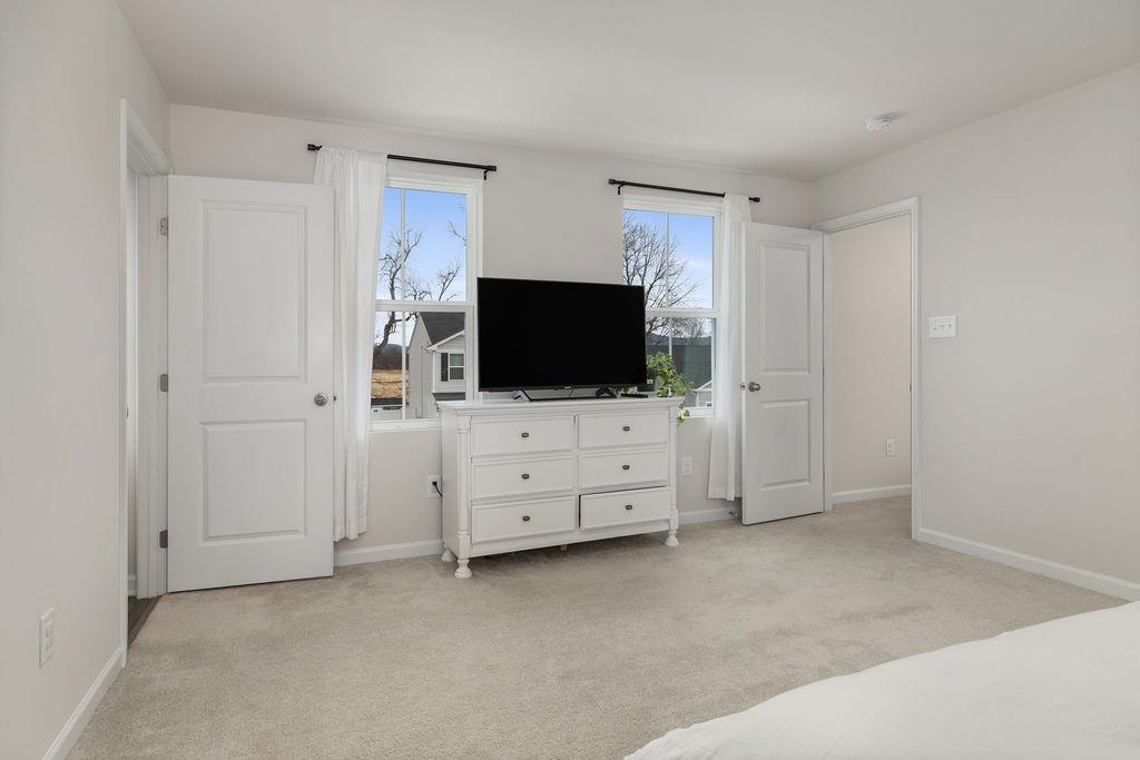 124 Walsh Lane Waynesboro, VA 22980 - Photo 29 of 42 a room with furniture and flat screen tv