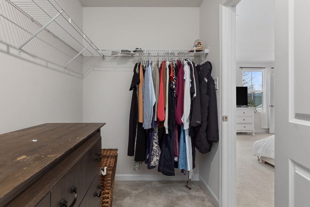 124 Walsh Lane Waynesboro, VA 22980 - Photo 30 of 42 a view of walk in closet with clothes