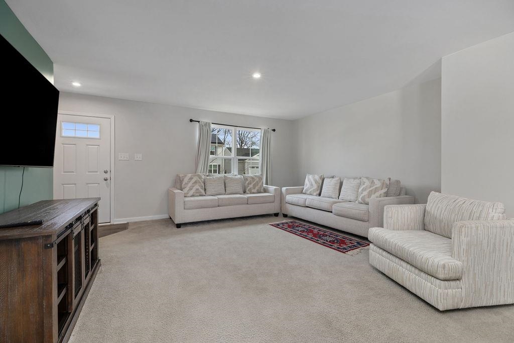 124 Walsh Lane Waynesboro, VA 22980 - Photo 3 of 42 a living room with furniture and a flat screen tv
