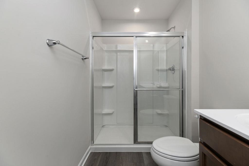 124 Walsh Lane Waynesboro, VA 22980 - Photo 32 of 42 a bathroom with a shower a toilet and sink