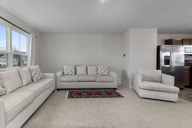a living room with furniture and a couch