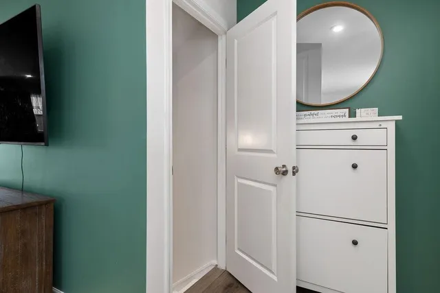 a bathroom with a mirror and a sink