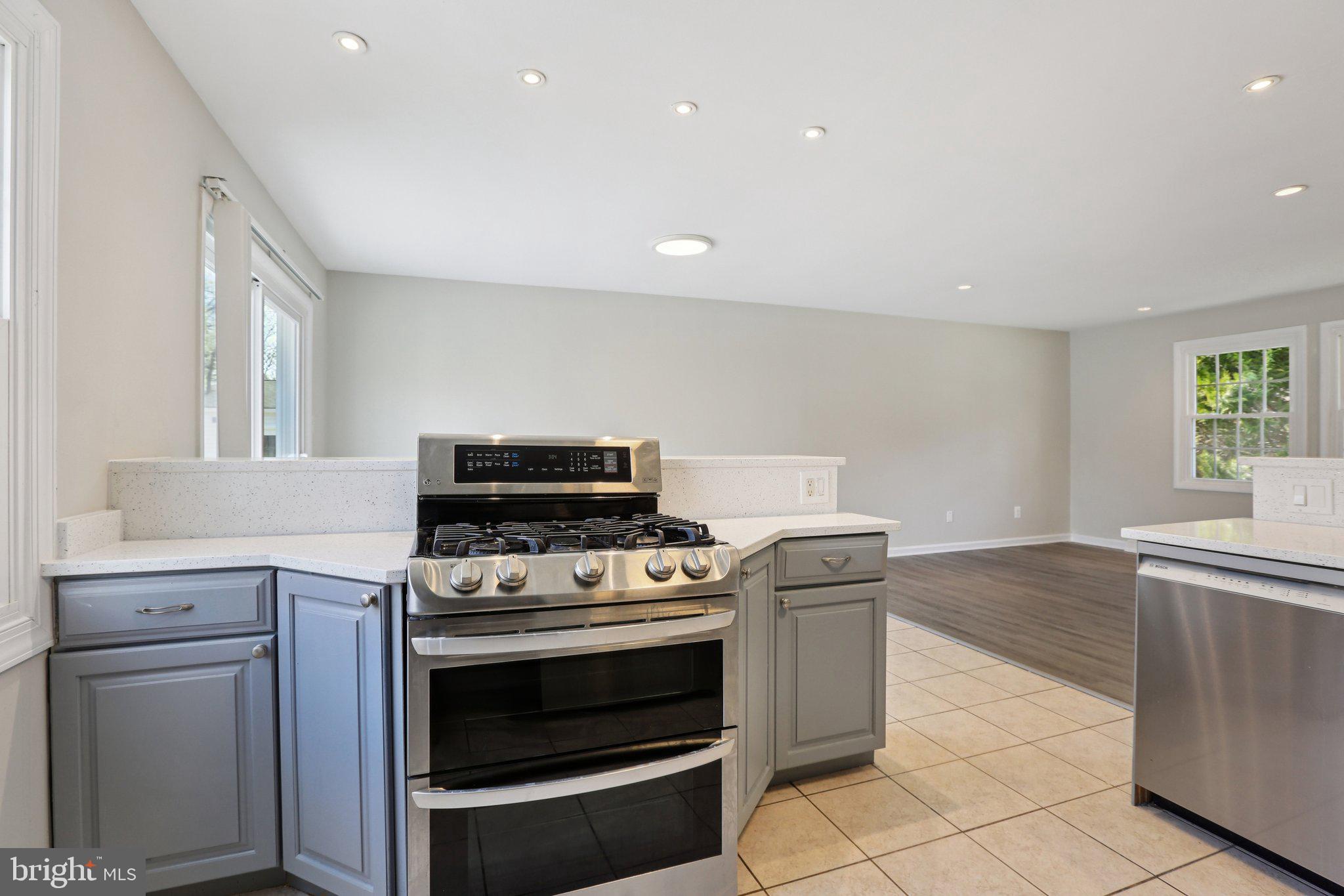 5415 Thunder Hill Road Columbia, MD 21045 - Photo 12 of 54 a kitchen with a stove and a sink