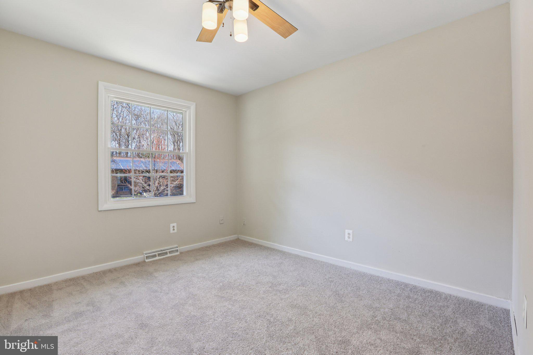 5415 Thunder Hill Road Columbia, MD 21045 - Photo 18 of 54 an empty room with a window