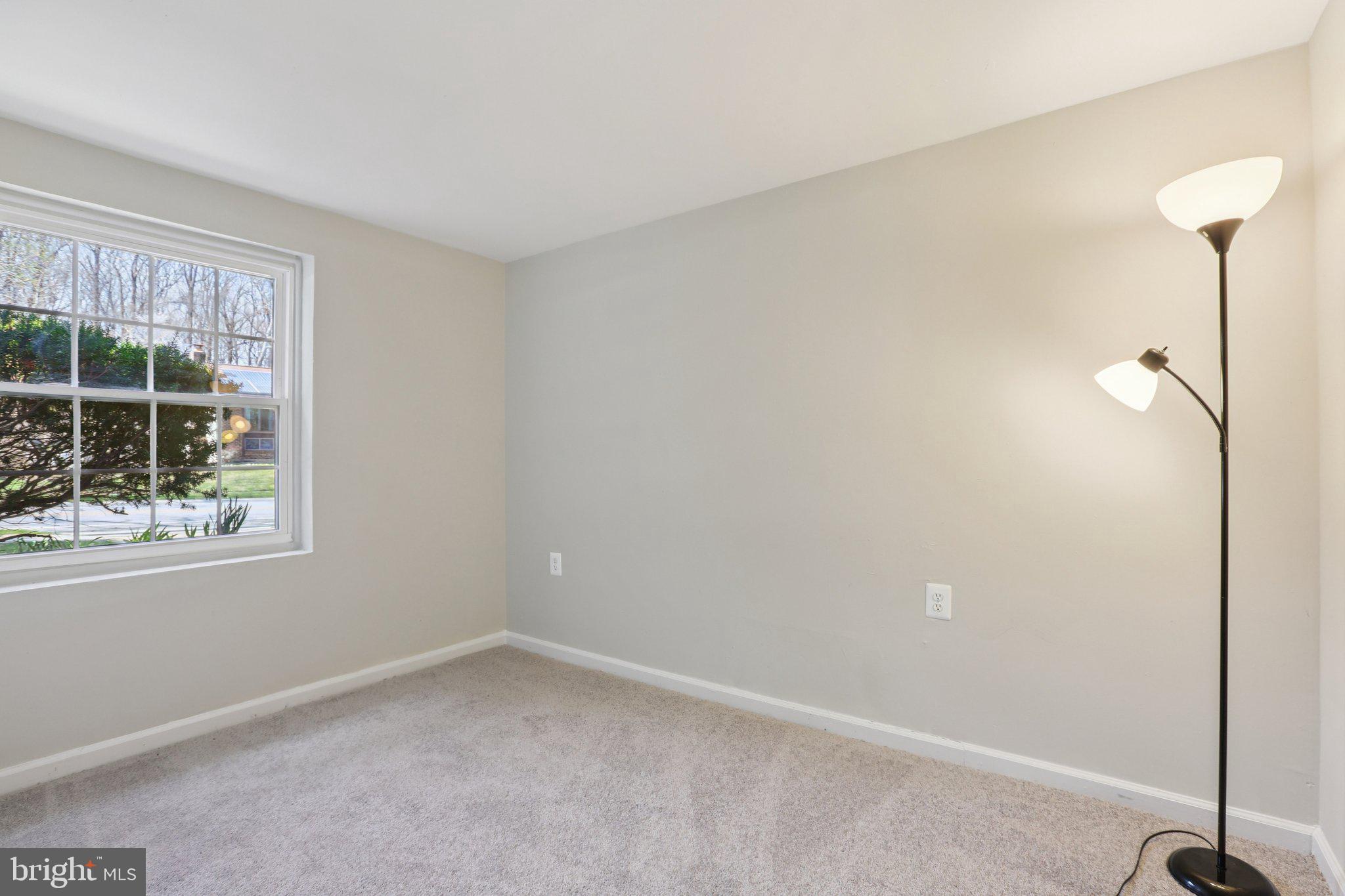5415 Thunder Hill Road Columbia, MD 21045 - Photo 23 of 54 an empty room with a window