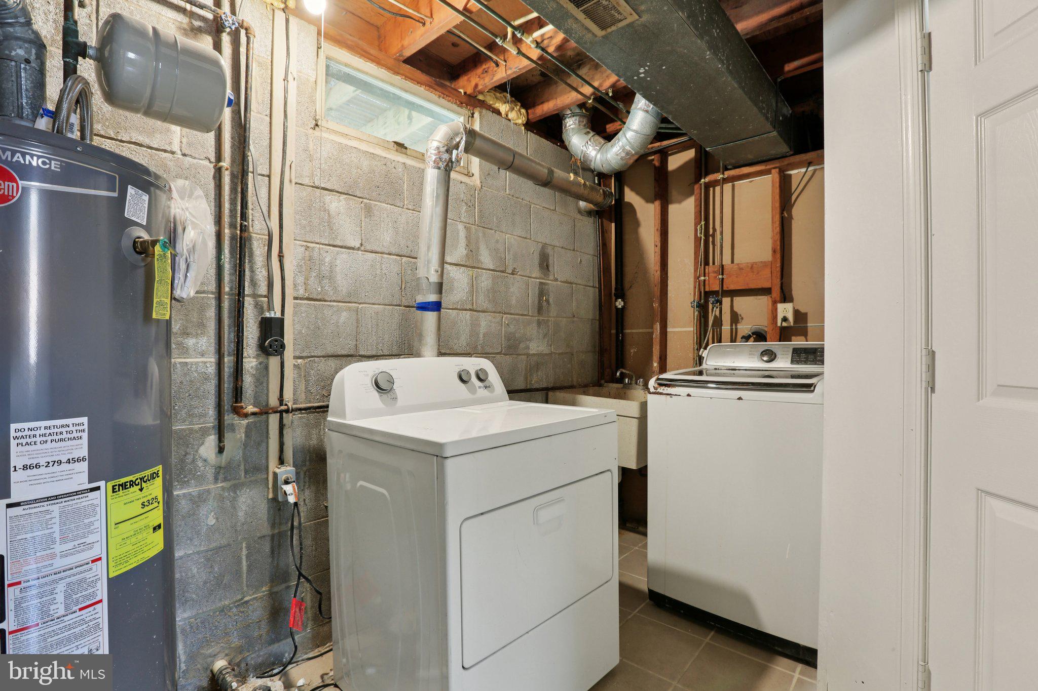 5415 Thunder Hill Road Columbia, MD 21045 - Photo 28 of 54 a utility room with dryer and washer