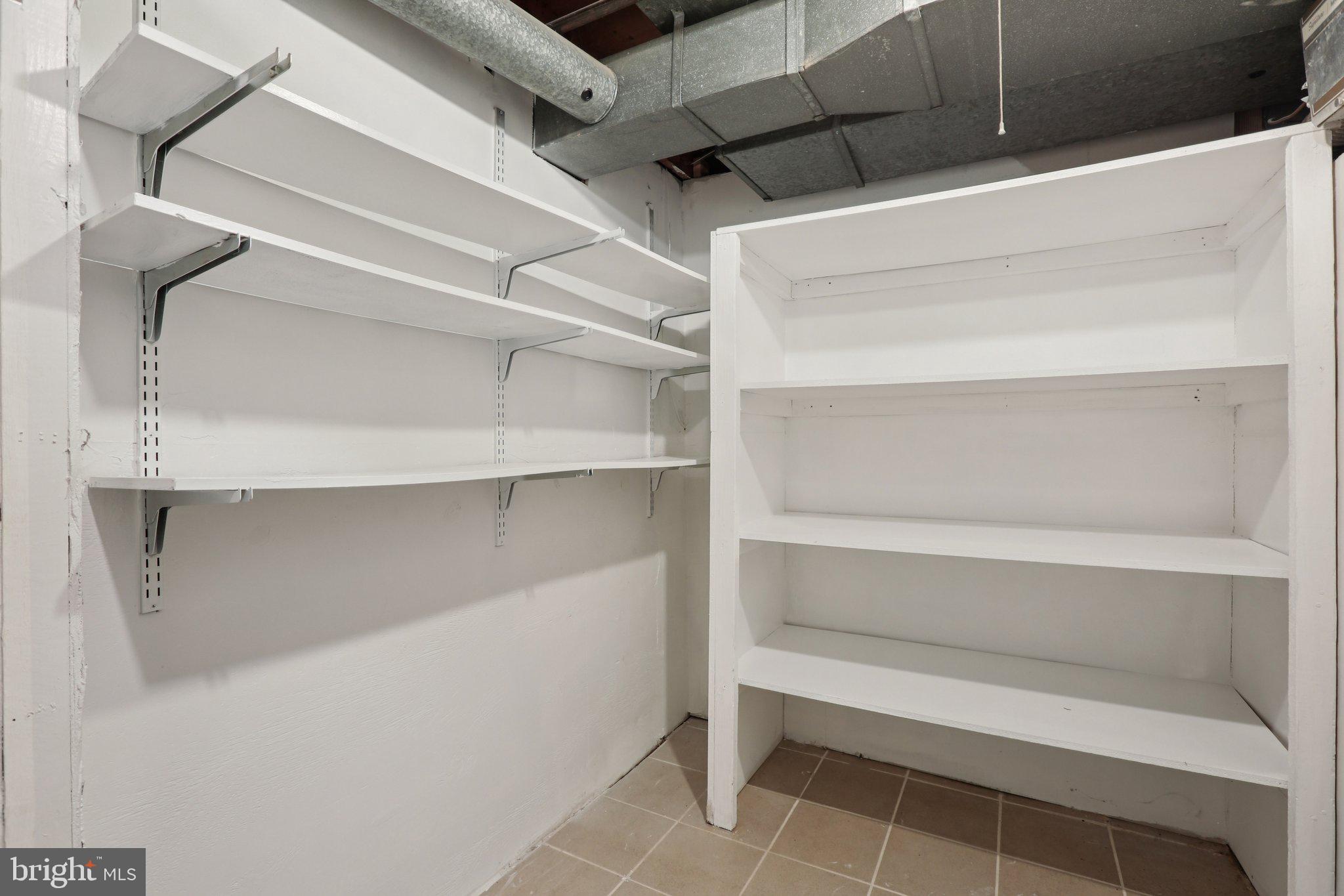 5415 Thunder Hill Road Columbia, MD 21045 - Photo 29 of 54 a view of walk in closet with empty racks