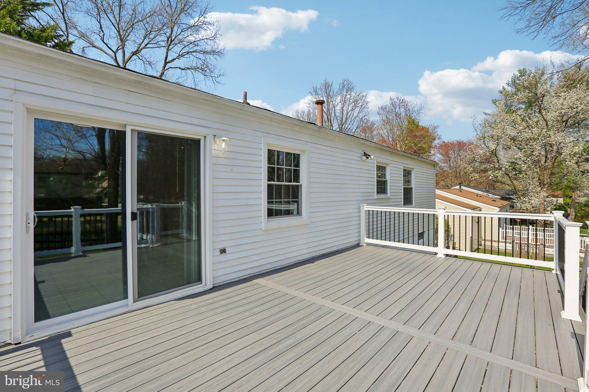 5415 Thunder Hill Road Columbia, MD 21045 - Photo 31 of 54 a view of a house with a deck
