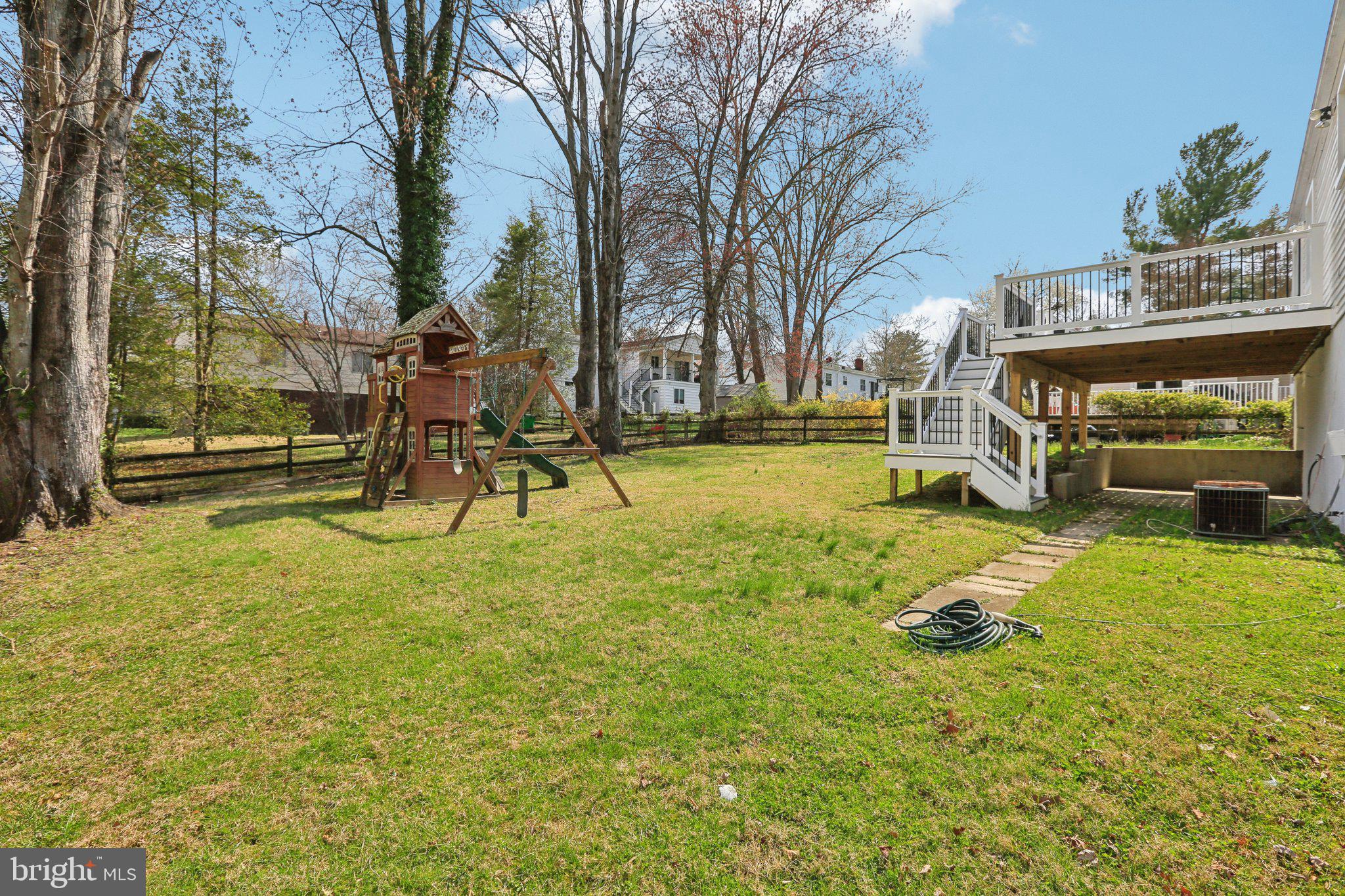 5415 Thunder Hill Road Columbia, MD 21045 - Photo 32 of 54 a view of a backyard with a table and chairs