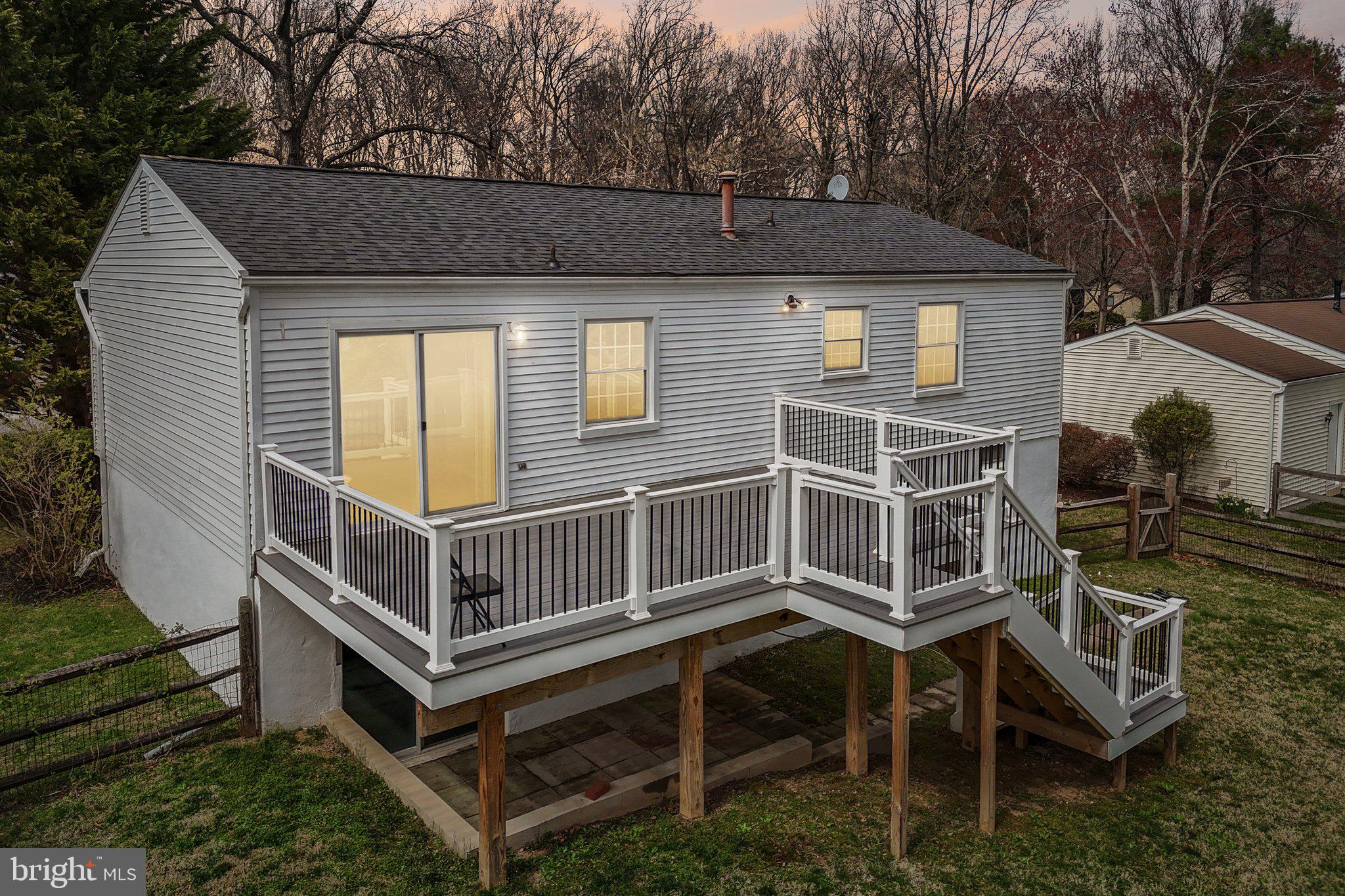 5415 Thunder Hill Road Columbia, MD 21045 - Photo 38 of 54 a front view of a house with a yard