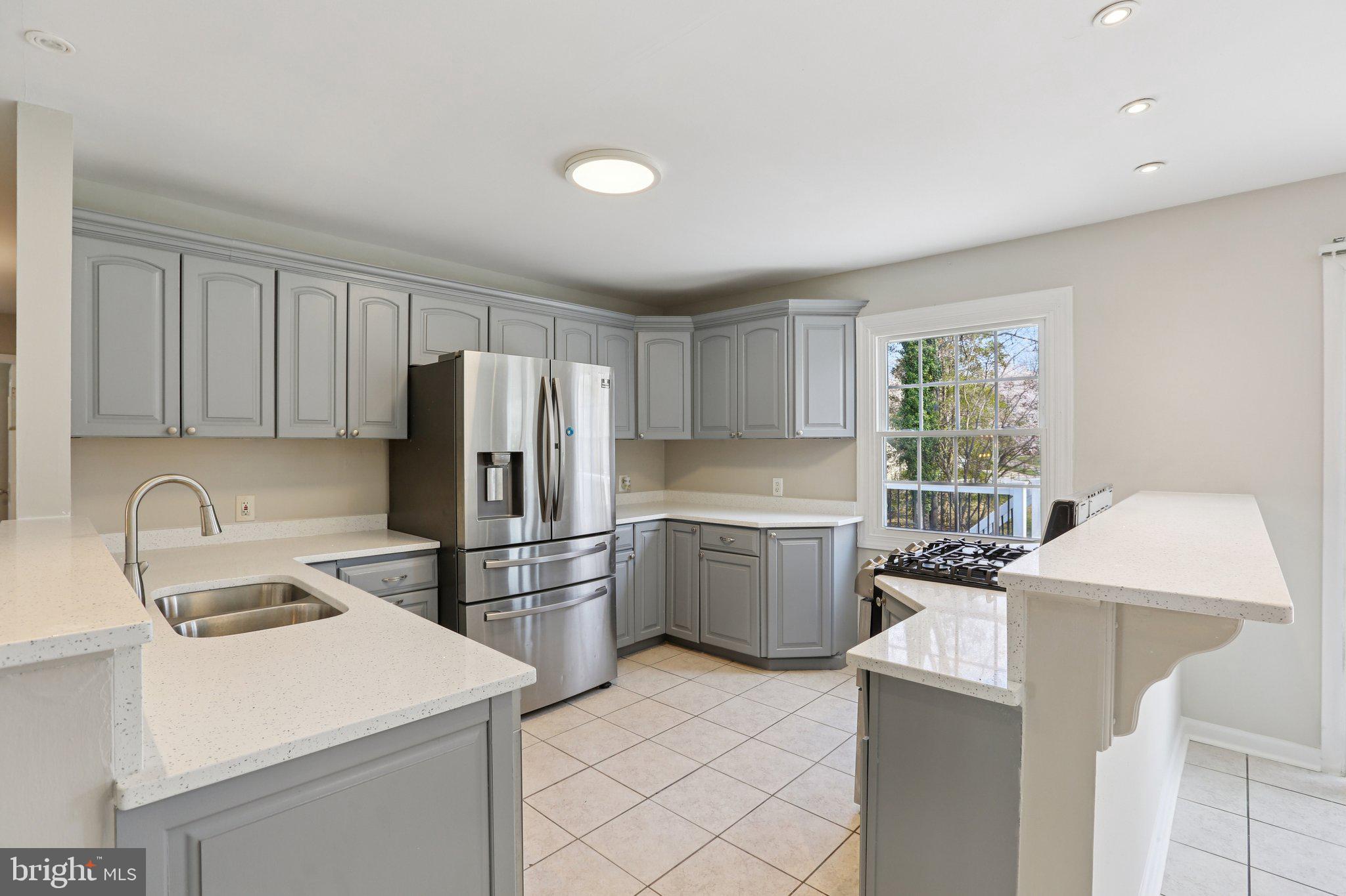 5415 Thunder Hill Road Columbia, MD 21045 - Photo 10 of 54 a kitchen with a refrigerator sink and stove