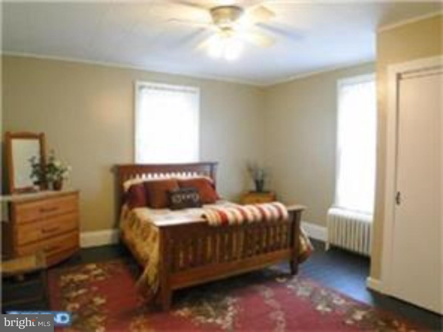 129 Maplewood Road Riegelsville, PA 18077 - Photo 11 of 13 a bedroom with a bed and a window