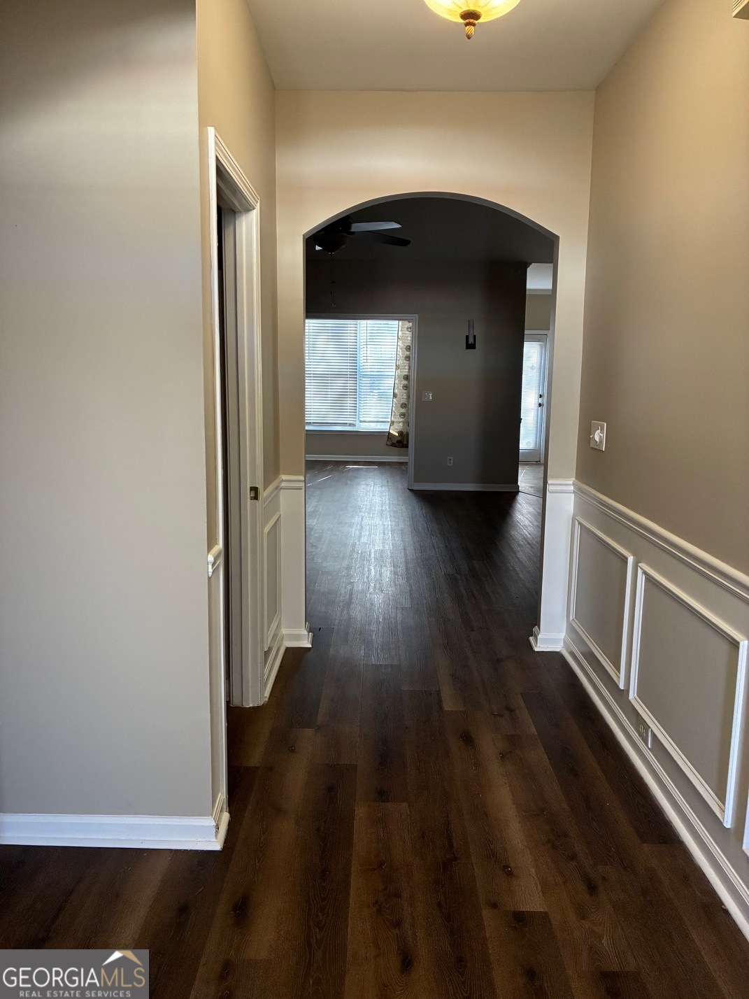 4230 Vinca Way Union City, GA 30291 - Photo 2 of 14 a view of a hallway with wooden floor and stairs