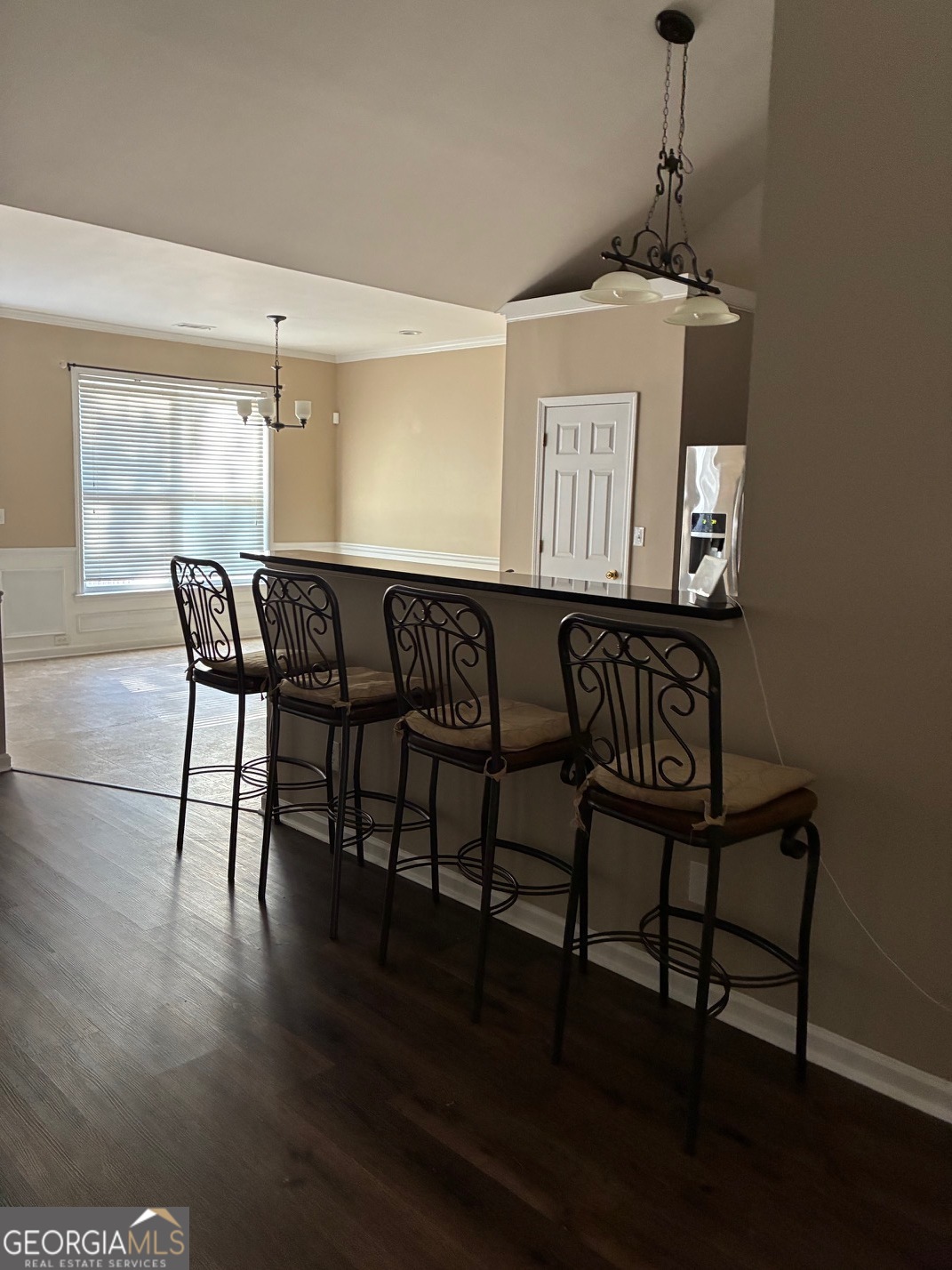 4230 Vinca Way Union City, GA 30291 - Photo 8 of 14 a view of a dining room with furniture and wooden floor