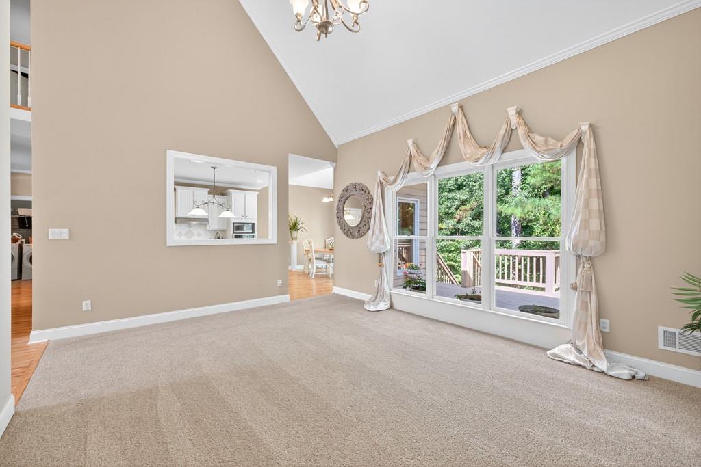 994 Fairview Club Circle Dacula, GA 30019 - Photo 12 of 57 en empty room with windows