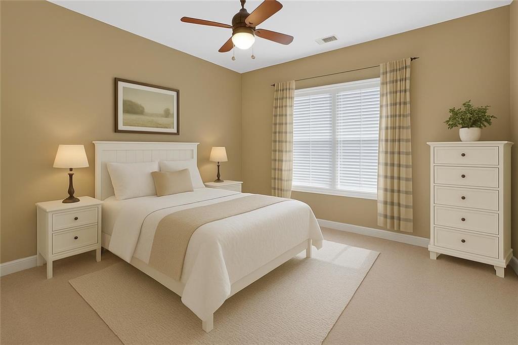 994 Fairview Club Circle Dacula, GA 30019 - Photo 20 of 57 a spacious bedroom with a large bed and a window