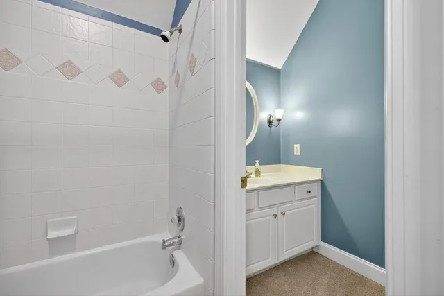 a living room with furniture window and a flat screen tv