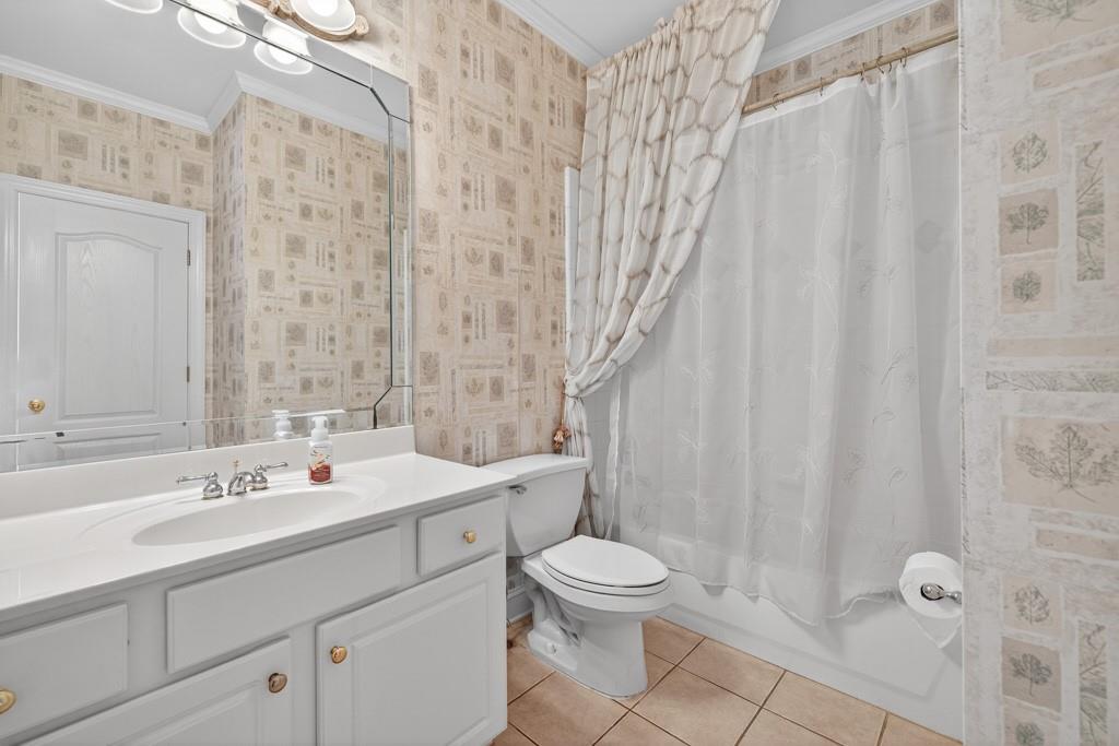 994 Fairview Club Circle Dacula, GA 30019 - Photo 25 of 57 a bathroom with a sink toilet and shower