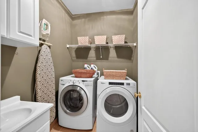 a room with pool table and windows