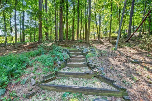a view of balcony with deck and wooden floor