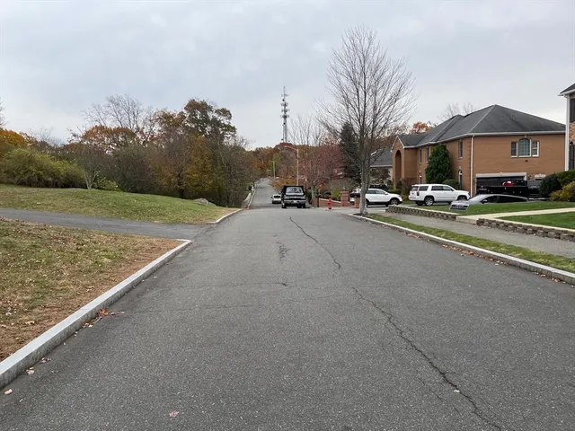 a view of a street with houses