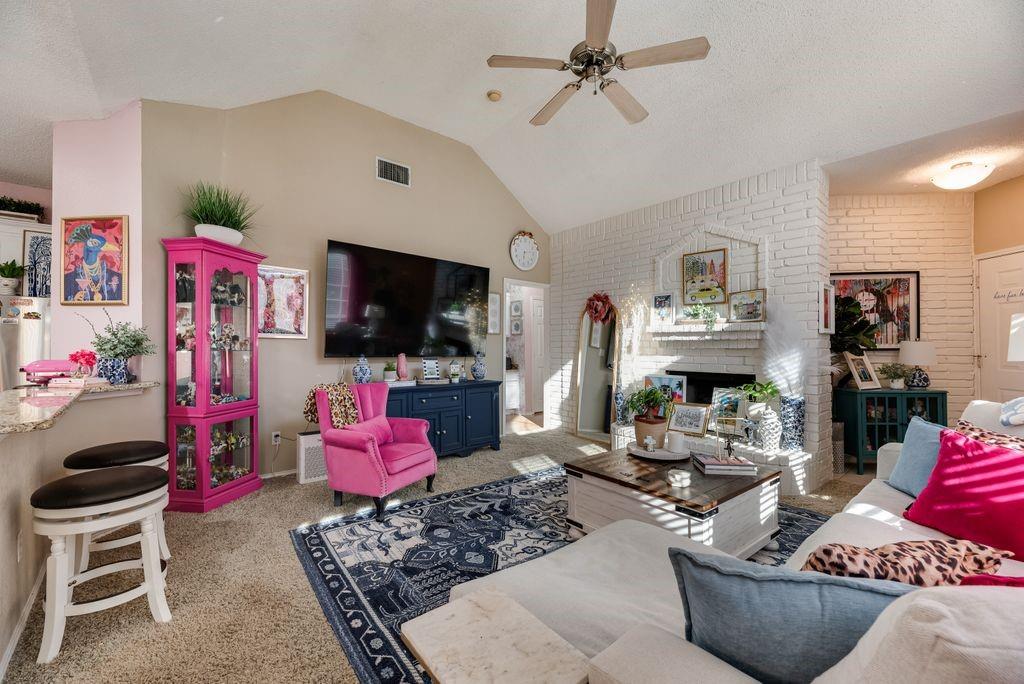 3205 Cape Cod Court Arlington, TX 76017 - Photo 6 of 30 a living room with furniture and a flat screen tv