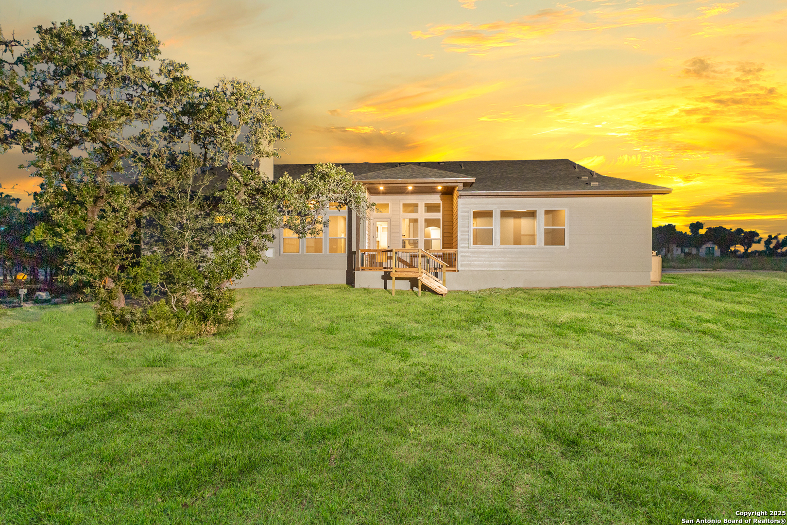 399 James Way Castroville, TX 78009 - Photo 31 of 32 a front view of house with yard and seating area