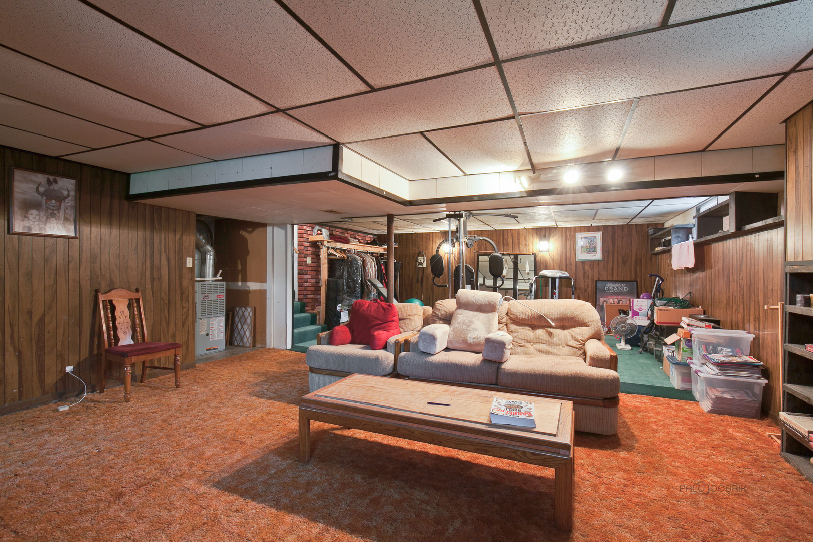 7712 Ravina Drive Spring Grove, IL 60081 - Photo 20 of 30 a living room with furniture and a glass door