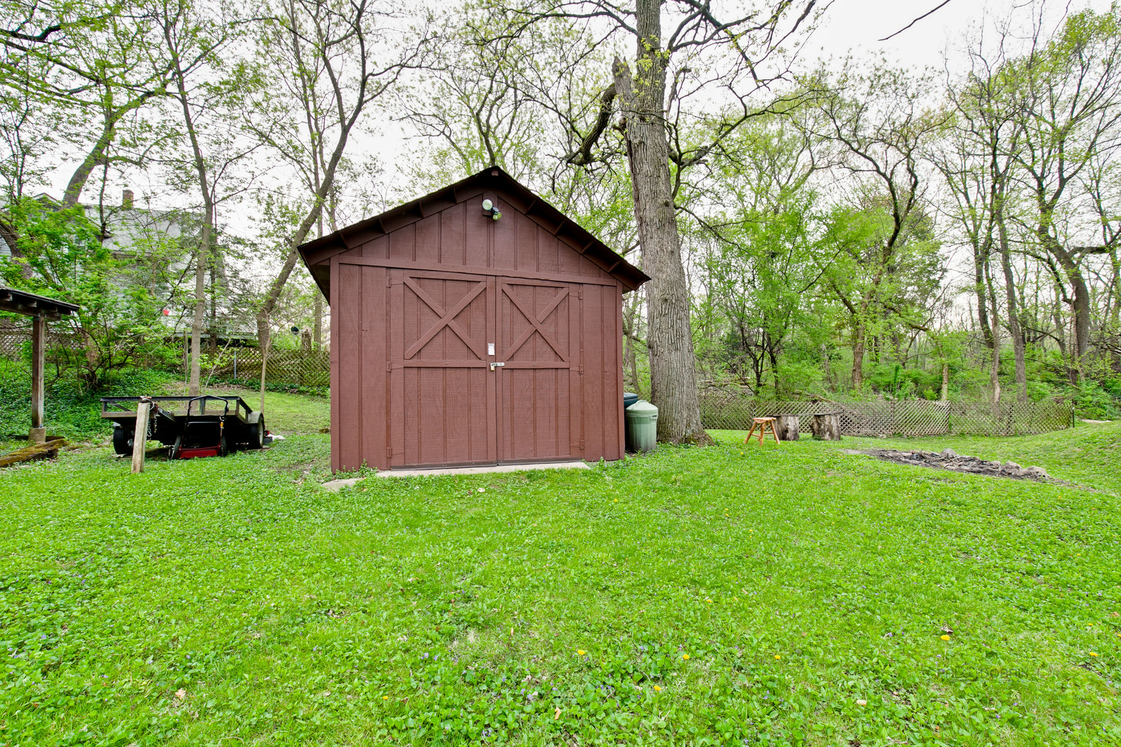 7712 Ravina Drive Spring Grove, IL 60081 - Photo 23 of 30 a view of backyard with garden and trees