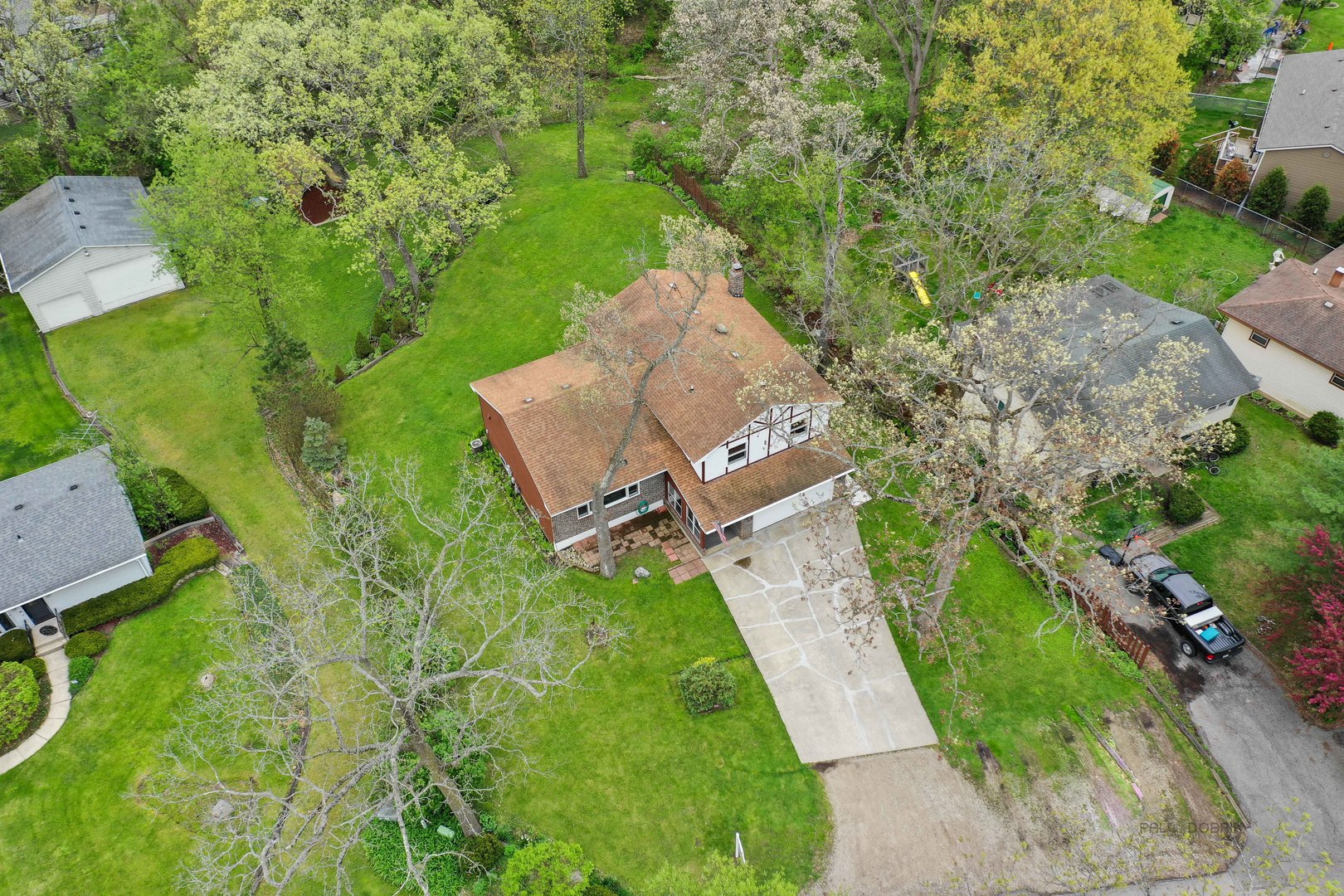 7712 Ravina Drive Spring Grove, IL 60081 - Photo 25 of 30 an aerial view of residential house with outdoor space